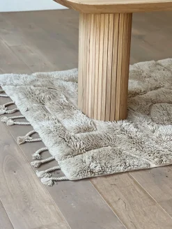Tapis en laine beige