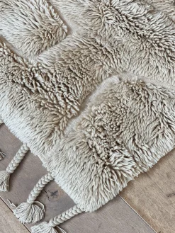 Tapis en laine beige